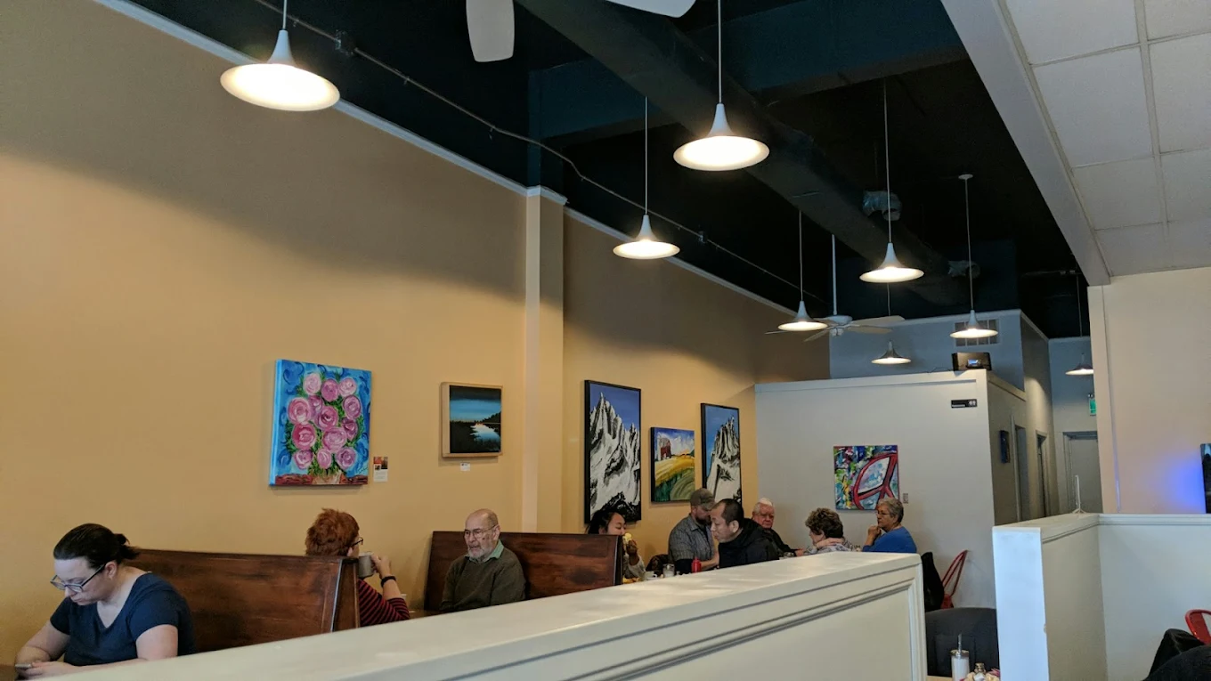 People enjoying food at Main Street Cafe